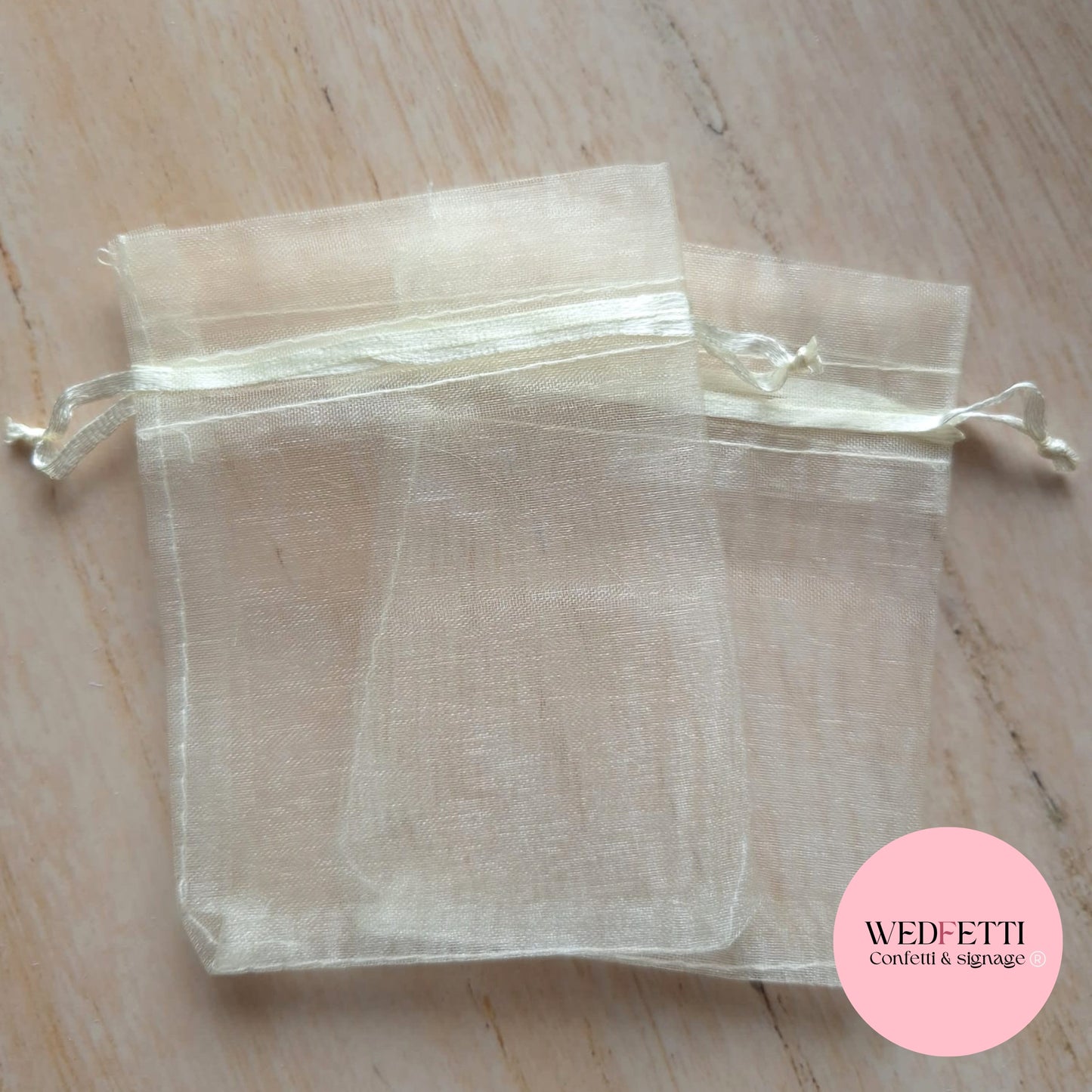 Light beige sheer drawstring organza bags (empty)