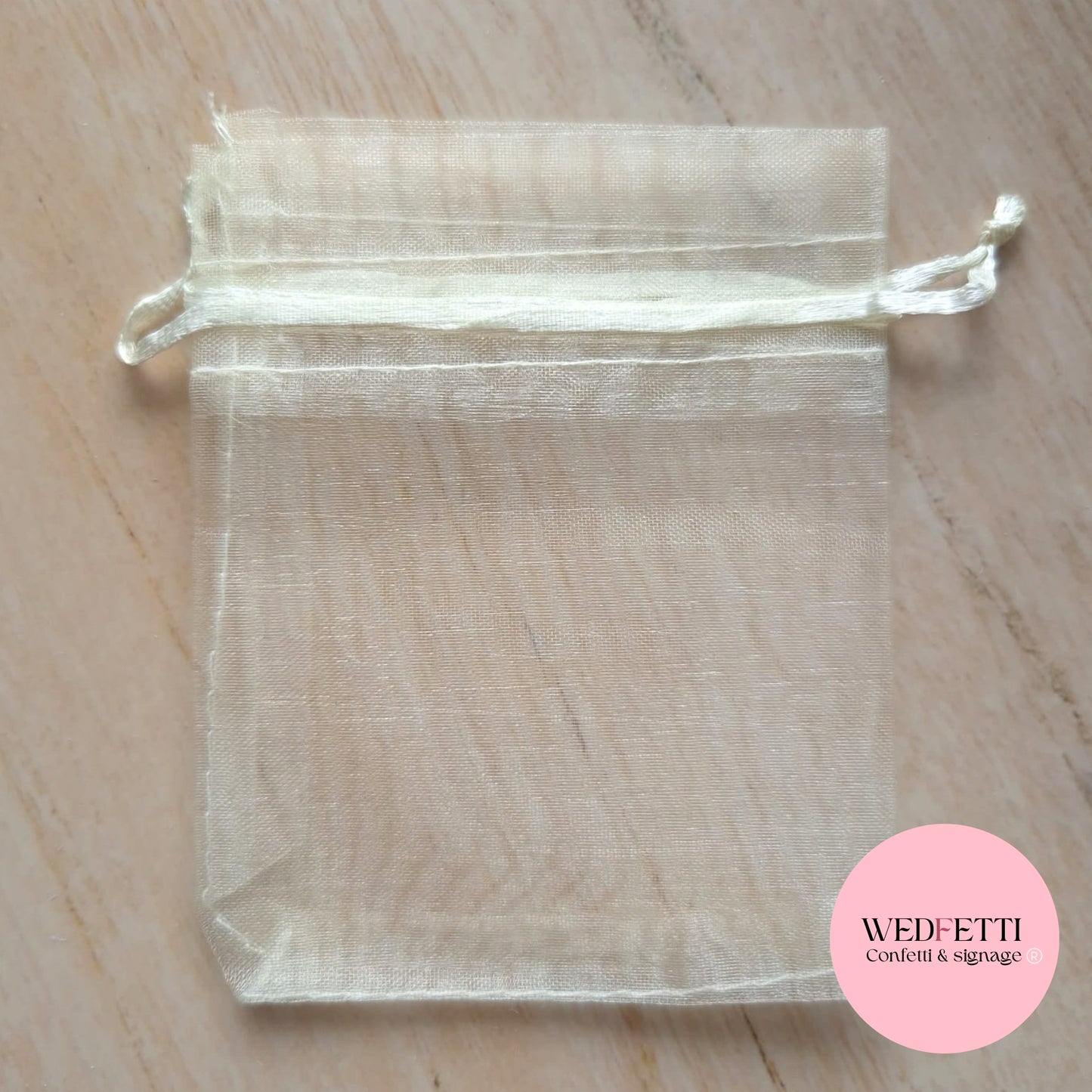 Light beige sheer drawstring organza bags (empty)