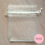 Light beige sheer drawstring organza bags (empty)