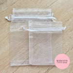 White sheer drawstring organza bags (empty)